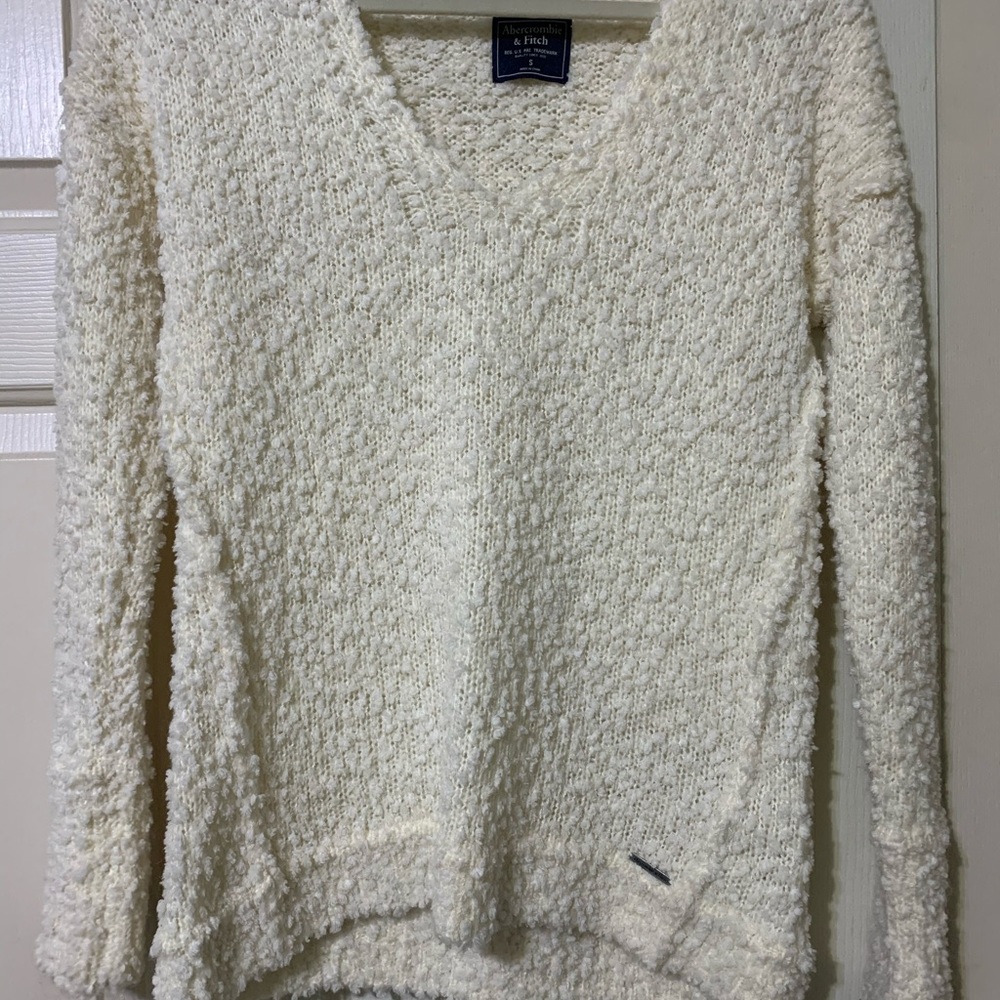 white sweater